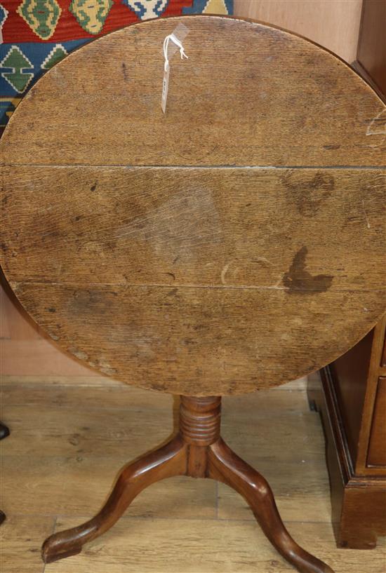 A George III circular oak tea table Diameter 72cm